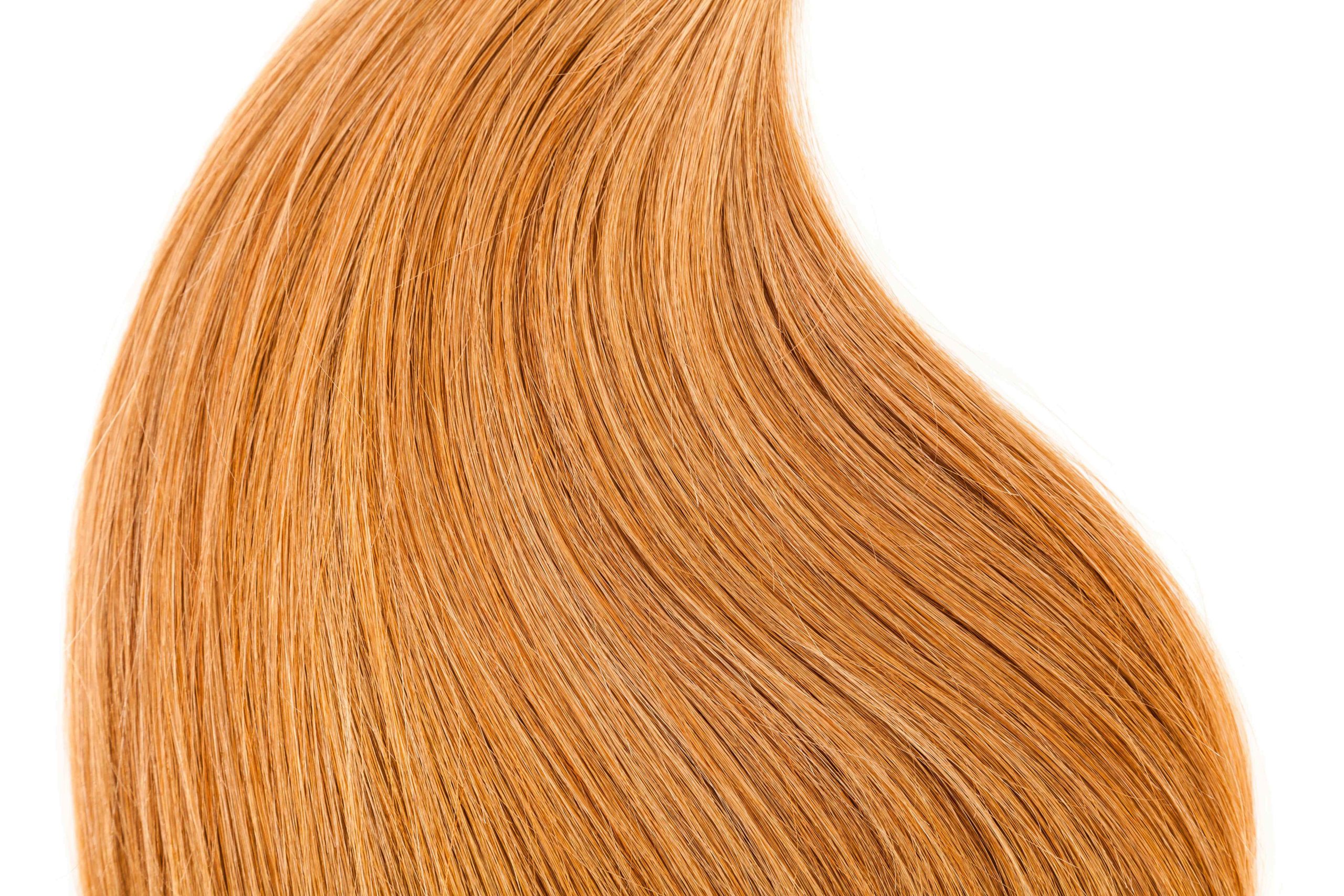 close up of Monofibre JNR hair extensions - light brown